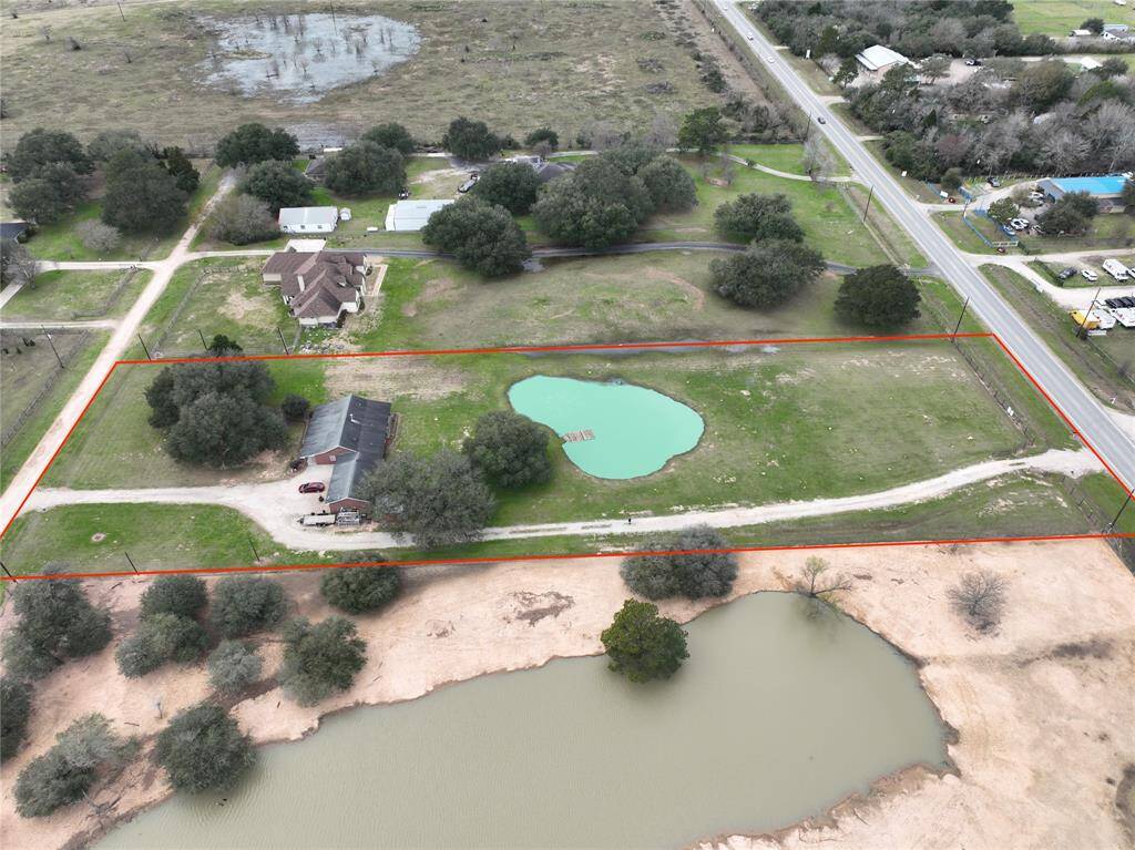 2920 is right side of photo- private road entrance to left Aerial boundaries approximate