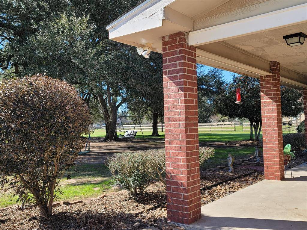 View from covered porch to park setting