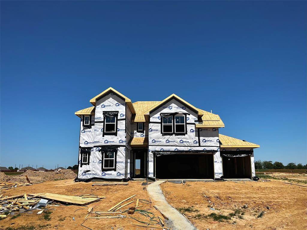Two story home with 5 bedrooms, 4.5 baths, and 3 car garage