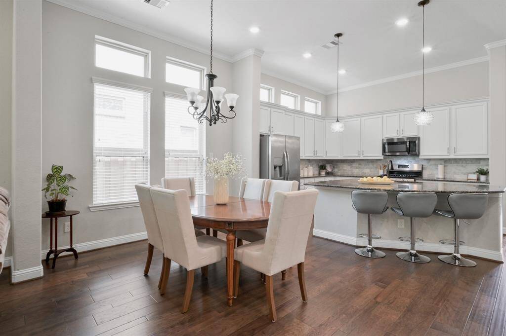 Beautiful Natural Sunlight showing off the gleaming wood floors