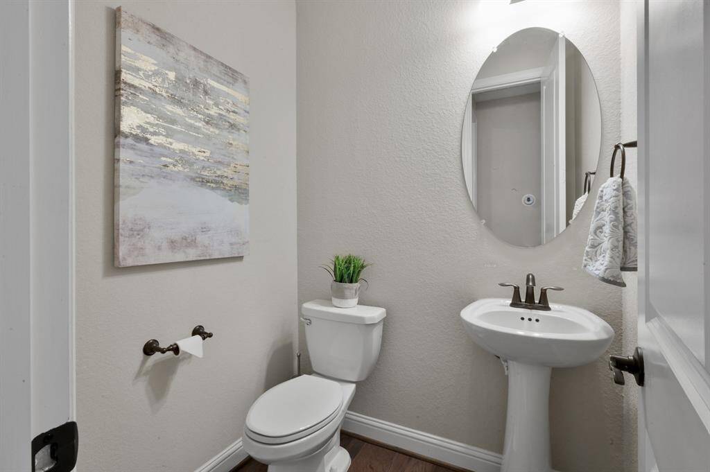 Your spacious POWDER ROOM is a great feature that not all homes have. This is a great addition for your guests to use and conveniently located in the living area.