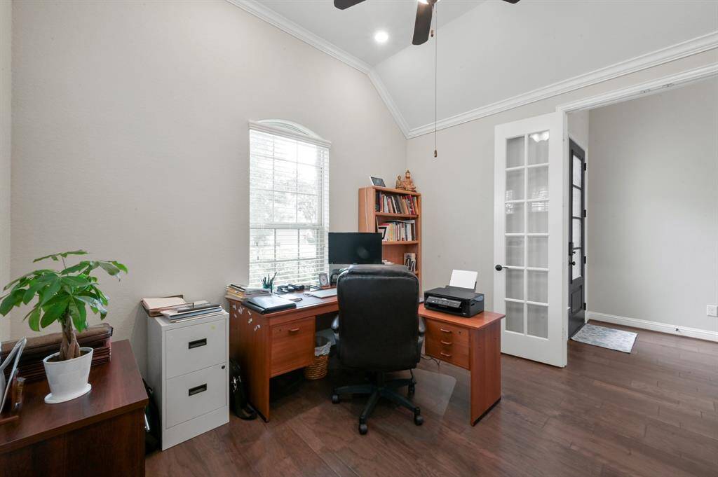 Your home office is located at the front of the home behind beautiful glass french doors