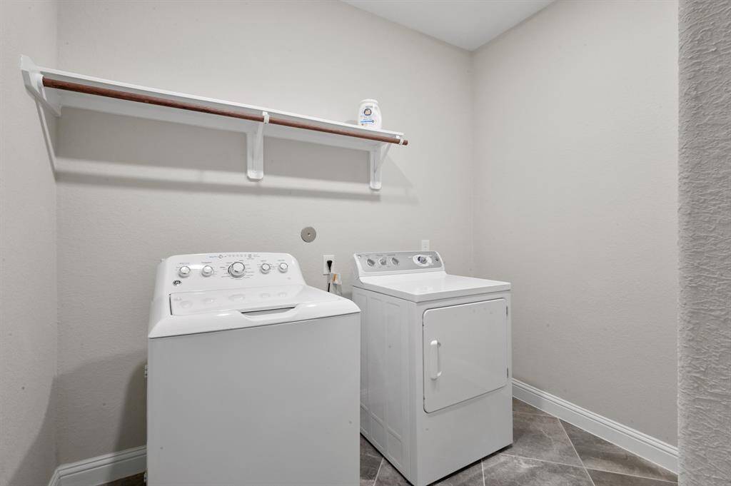 Your large Utility Room has enough room for a second fridge if desired. It is also a spot that can be transformed into a Mud Room.