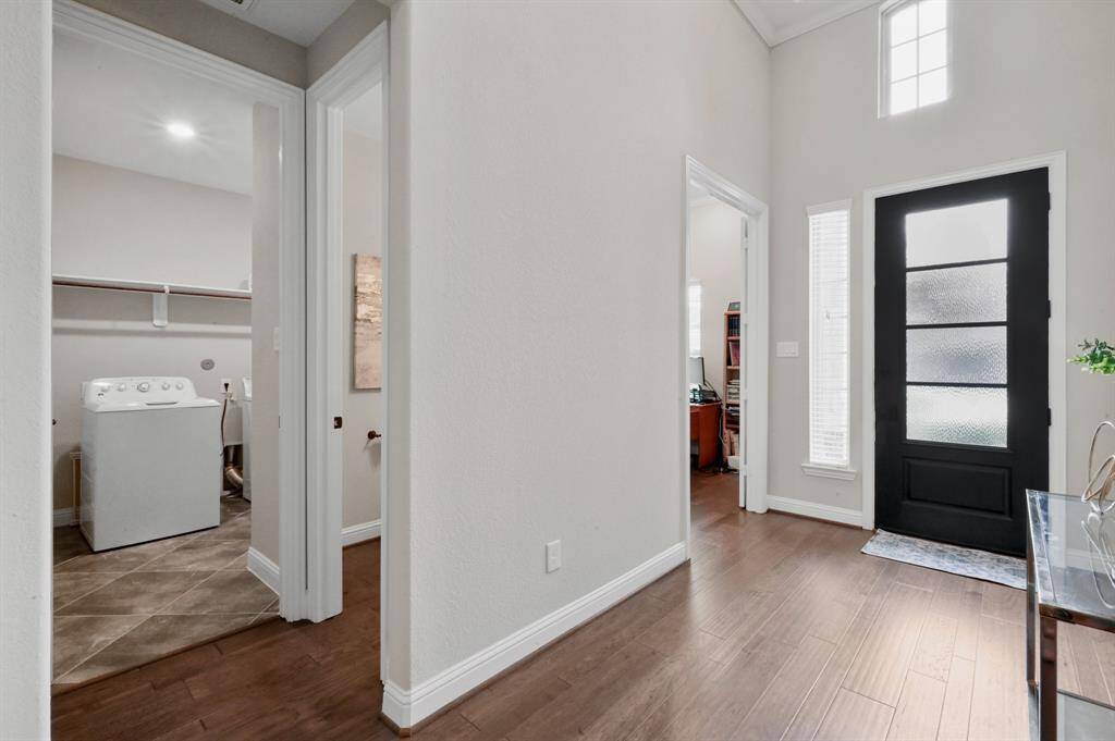 Your spacious & inviting entry immediately shows off your gleaming wood floors.