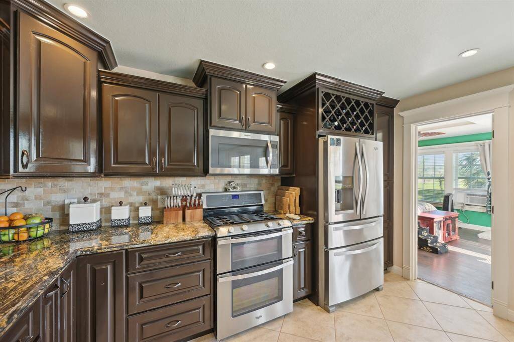 Double oven and stainless steel fridge