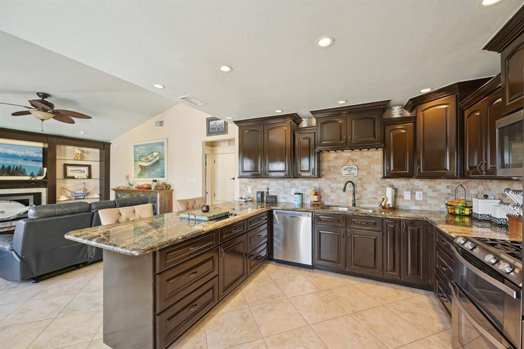 Tons of counter space and cooking room in this grand kitchen