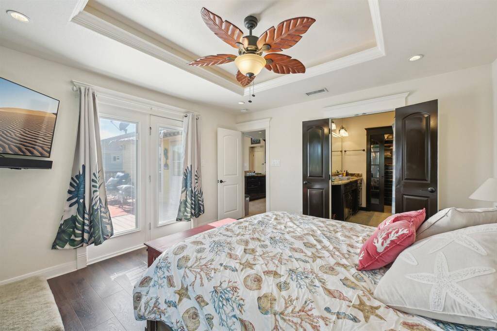 Primary bedroom with loads of natural lighting