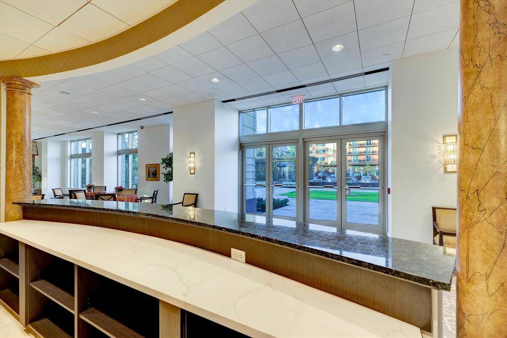 An additional view from the bar to the outdoors. The double, glass doors can open to the outside. Perfect for entertaining!