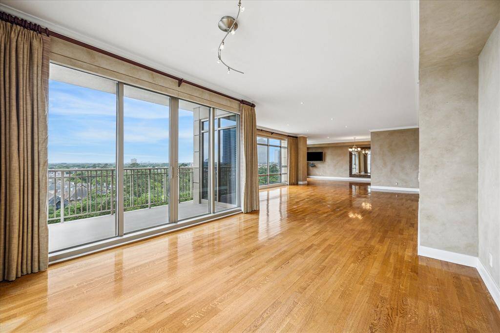 Another view of the living room and den which offers additional unobstructed views.