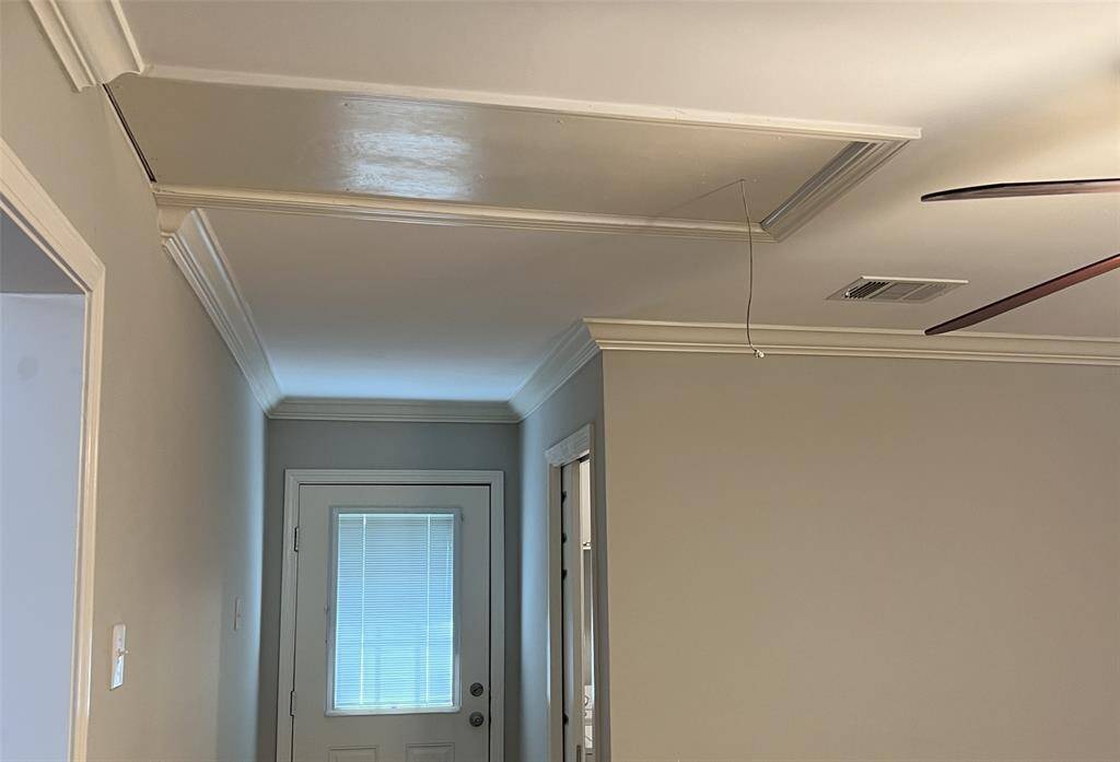The second access panel to the attic is located by the Utility Room.