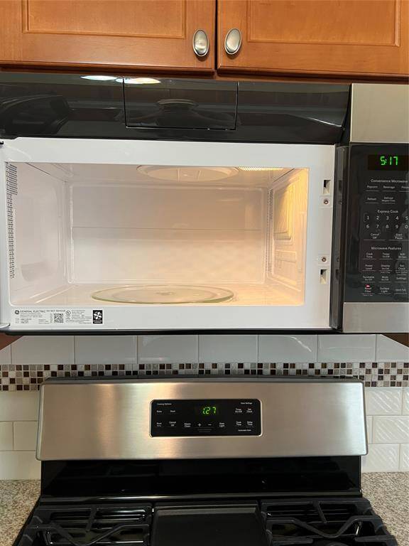 The stainless steel microwave oven is clean and new for you.