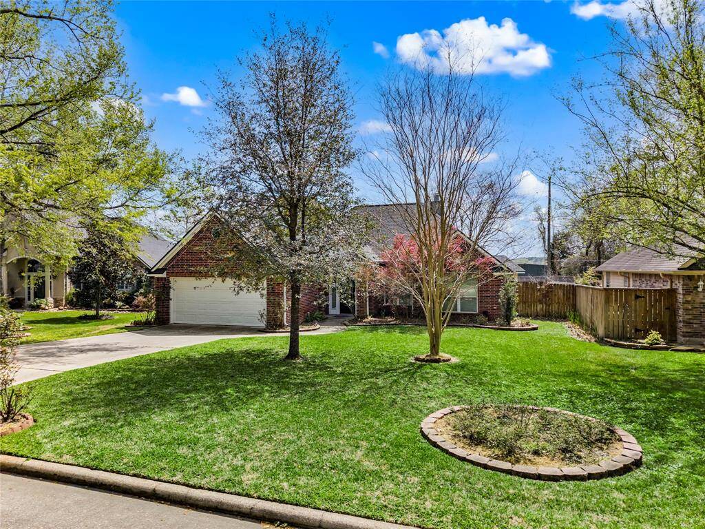Mature trees and landscaping make this feel like home.