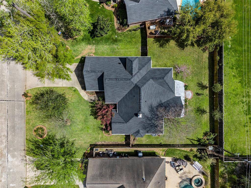 Aerial view of the property and the space between the neighbors.