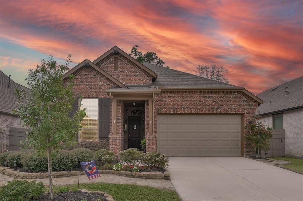This charming all-brick, one-story Highland Home offers exceptional comfort and style. The spacious primary suite features a bay window area and a luxurious bath with a separate shower and soaking tub. The modern kitchen boasts granite countertops, stainless steel appliances, and cabinet door pulls for a refined touch. Wood-look floors enhance the main areas, while plush carpet adds warmth to the bedrooms. Enjoy the convenience of a washer, dryer, refrigerator, and an energy-efficient tankless water heater.