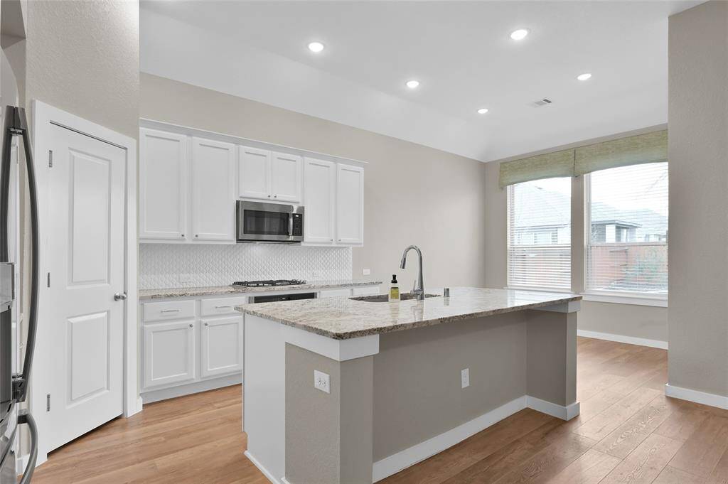 Cabinet door pulls add a stylish touch.
