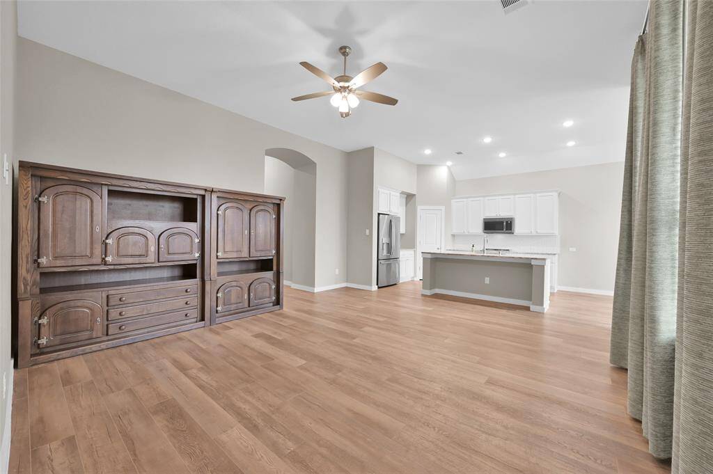 Wood-look floors bring warmth and durability.