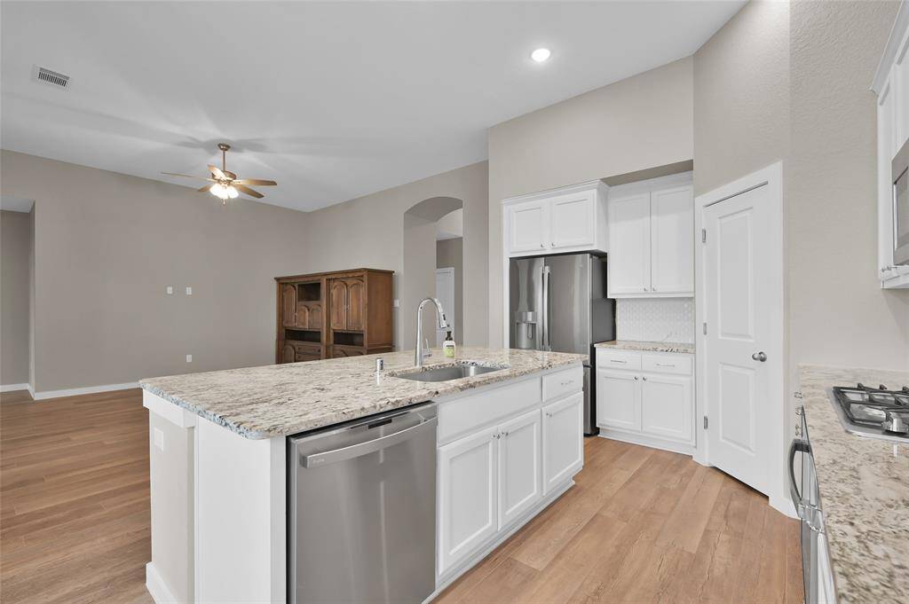 Open floor plan with large granite island