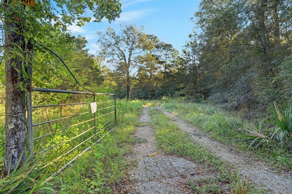 This quiet heavily wooded property is filled with rolling hills and beautiful terrain. You will never even know are so close to the city.