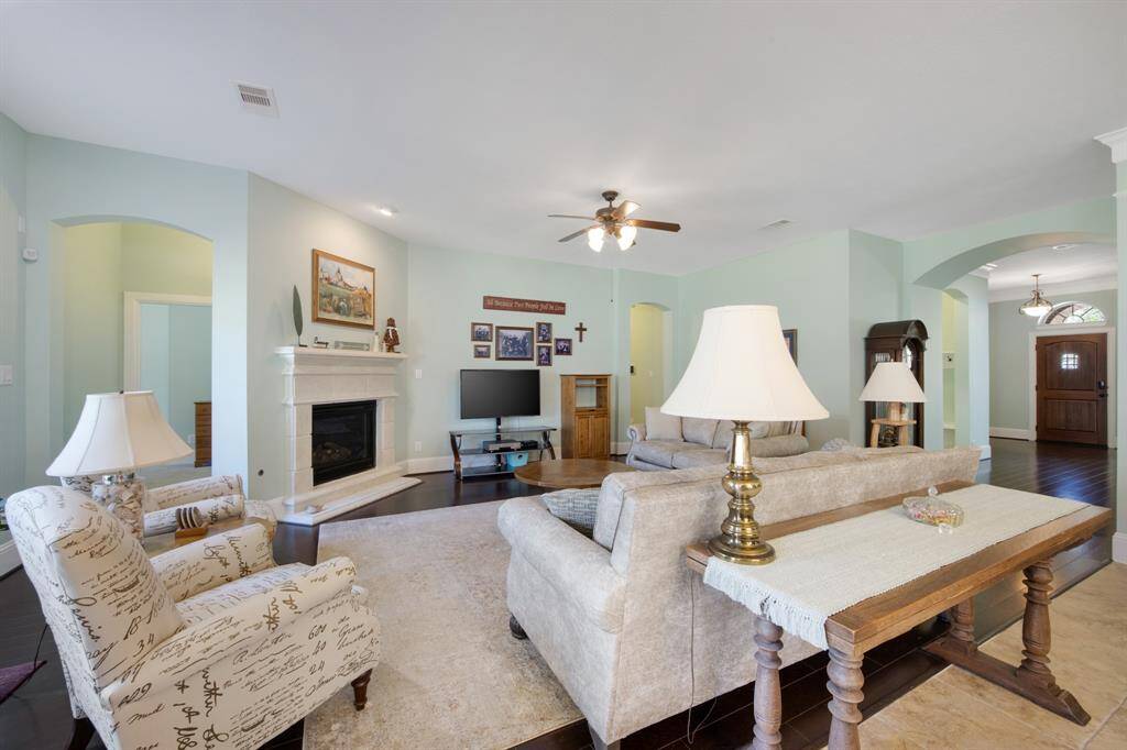 From another angle, the family room offers a spacious, inviting atmosphere for your guests.