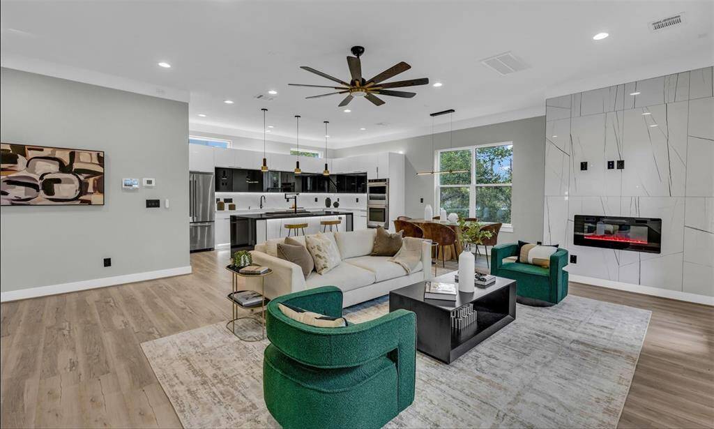 This residence boasts an open-concept layout, luxury finishes, and energy-efficient features.