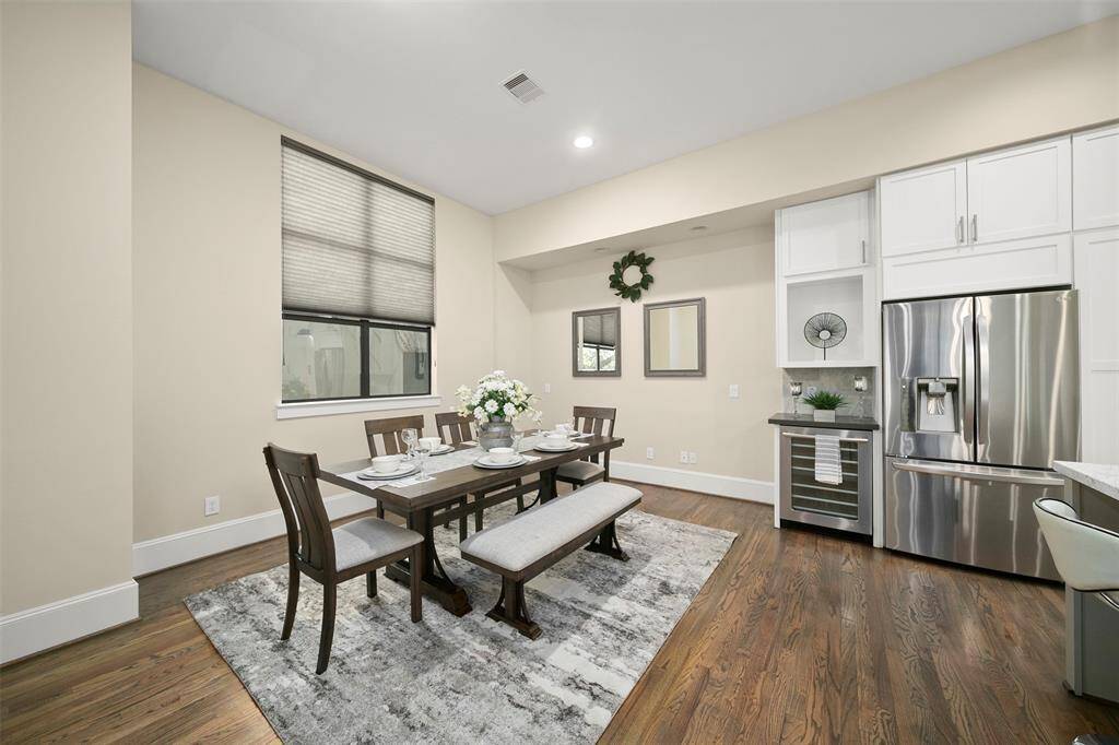 Dinning Room with large picture window that allows plenty of natural light.