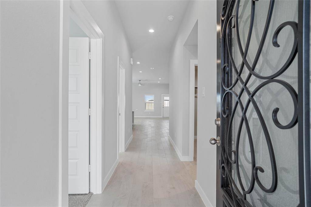 Welcome inside 611 Orchard Vale. As you enter, you will notice the beautiful ornate front door, wood look tile floring and bright entryway.