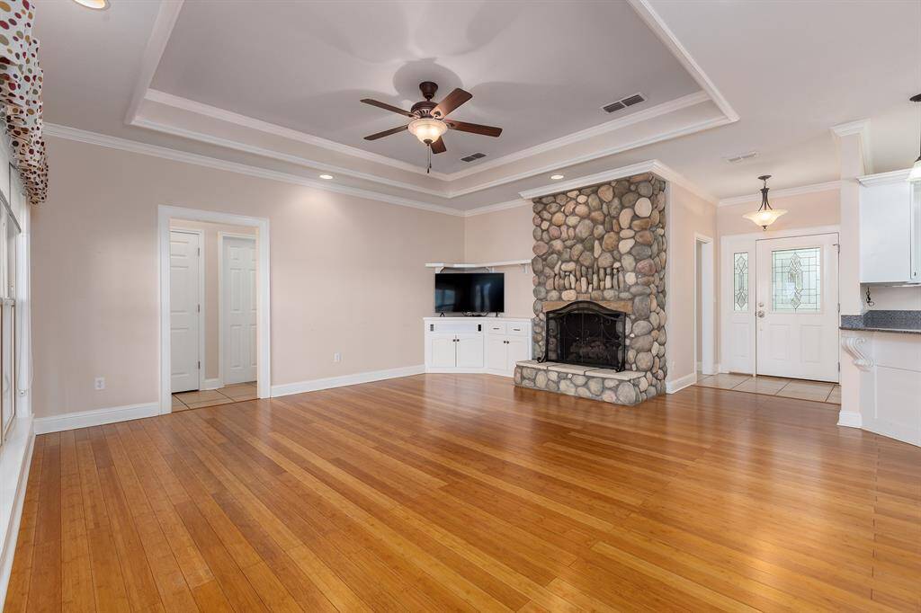 Notice the tray ceiling for added elegance and style with lighting for more ambiance