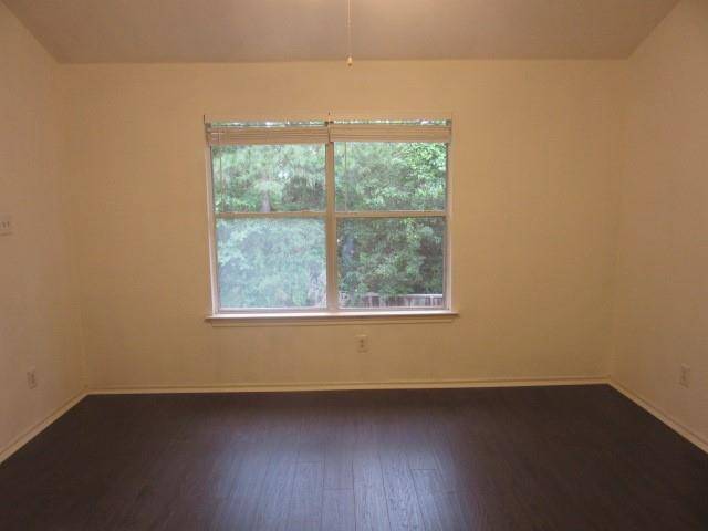 Primary bedroom without carpet