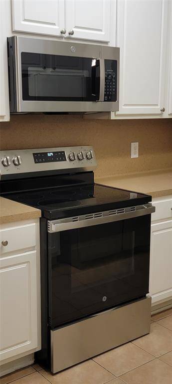 New microwave and electric owen with glass cooktop
