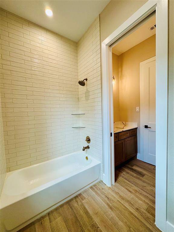 Main floor secondary bath with water closet.