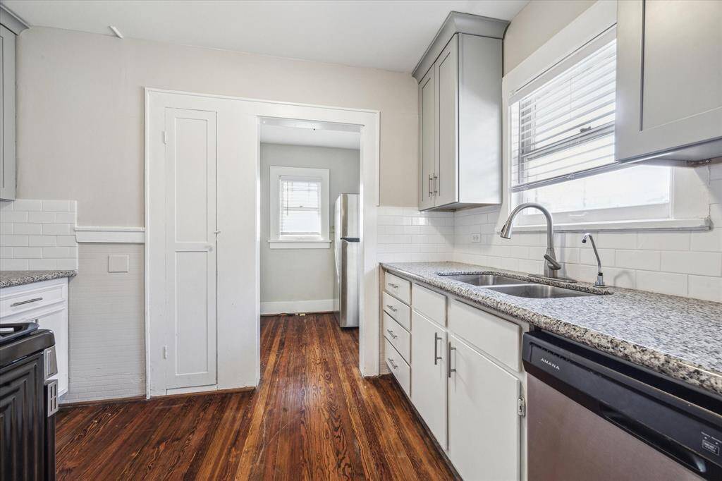 Kitchen has granite counter tops, recent stainless steel appliances and ample prep and storage space.