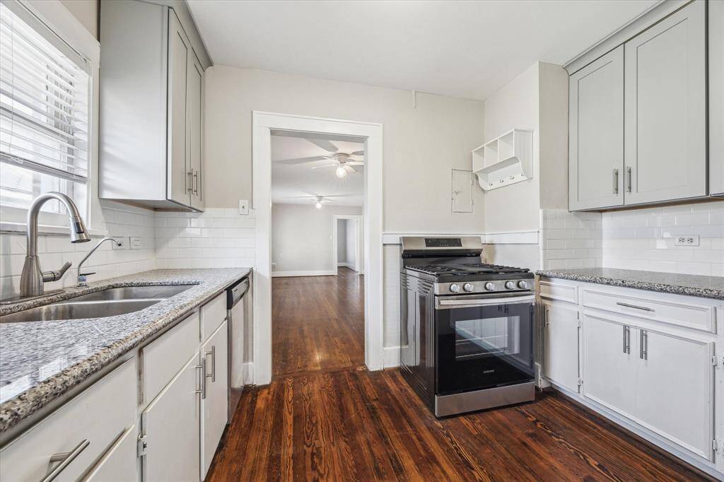 Additional view of the kitchen.