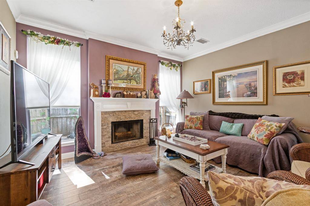 Another view of the spacious living room that looks out onto the private side patio.