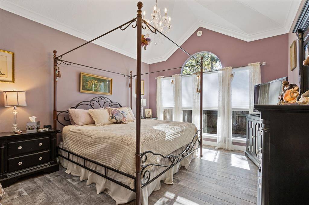 The grand primary bedroom is the perfect escape after a long day!  Note the cathedral like ceiling and the abundance of natural light.
