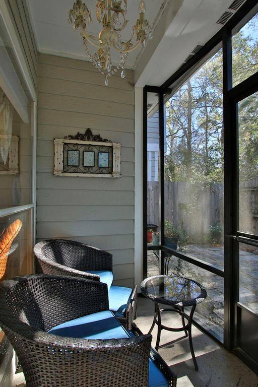 Enjoy a morning coffee or evening beverage on the screened in side patio!  This space faces Southeast so no hot afternoon sun.