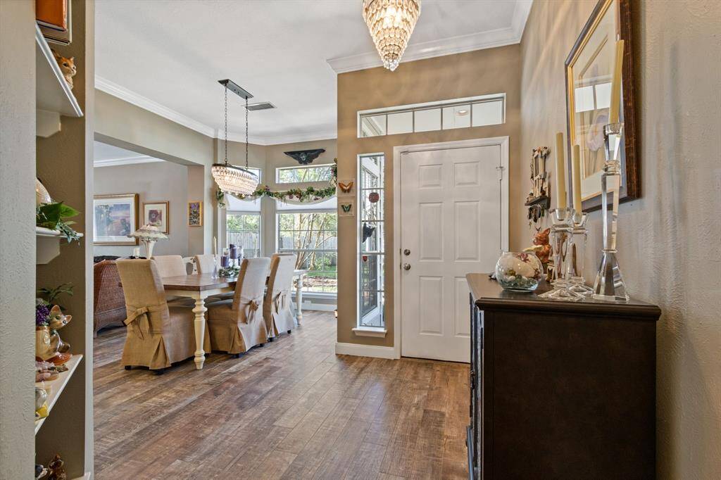 Neutral paint colors also run throughout the interior, which combined with the wood-like flooring, create a wonderful flow to the entire home.