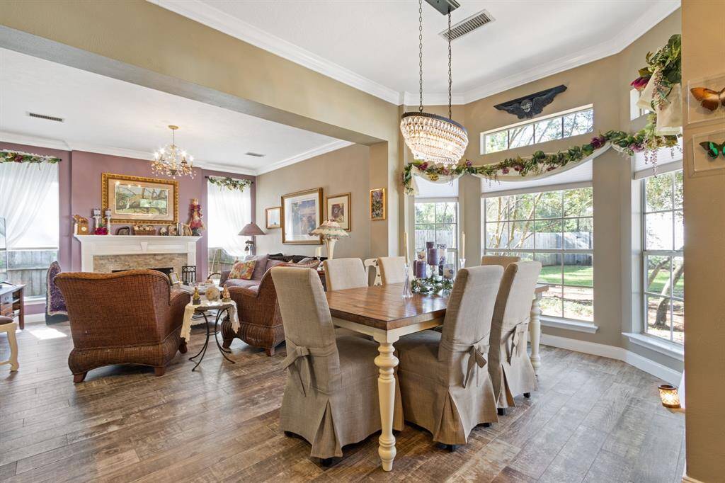 Large windows fill the entire unit with tons of natural light.  Speaking of light, check out the awesome light fixtures that also run throughout the home!