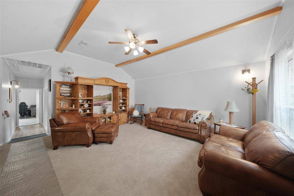 4930 Pleasure Lake Lane. Lake Conroe Living, just steps away from the Marina, Clubhouse, Tennis and Pickleball Courts.  Waterfront walks every day!