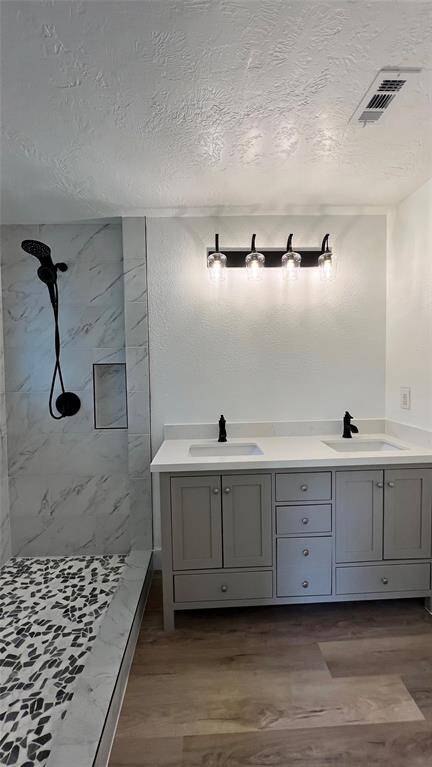 Primary en suite with double vanity and extra large shower