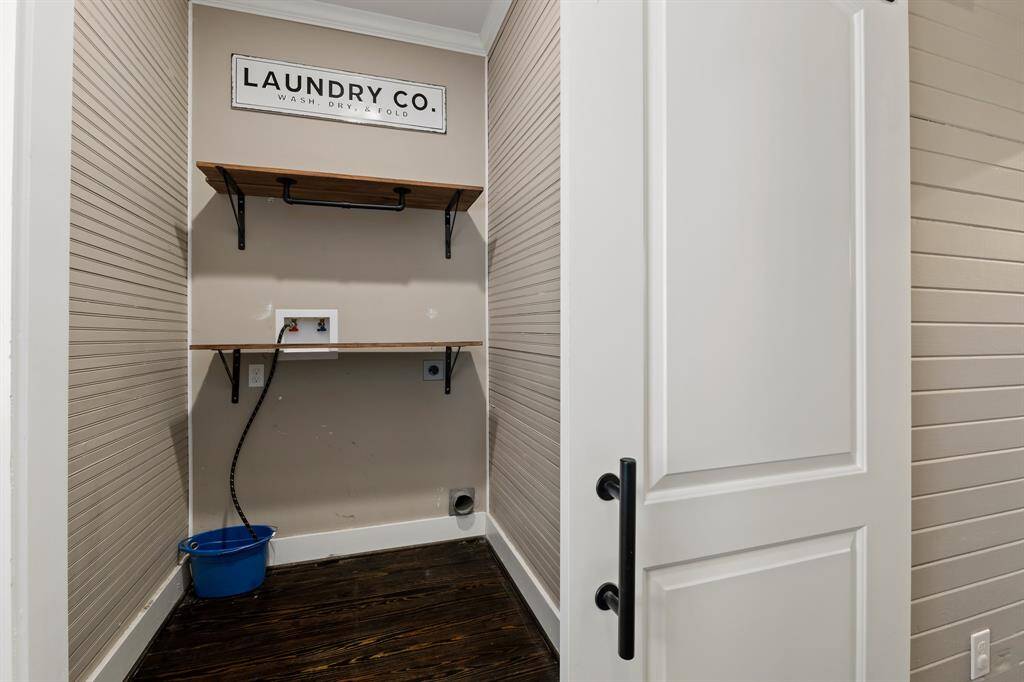 Laundry room, fits a large washer and dryer.