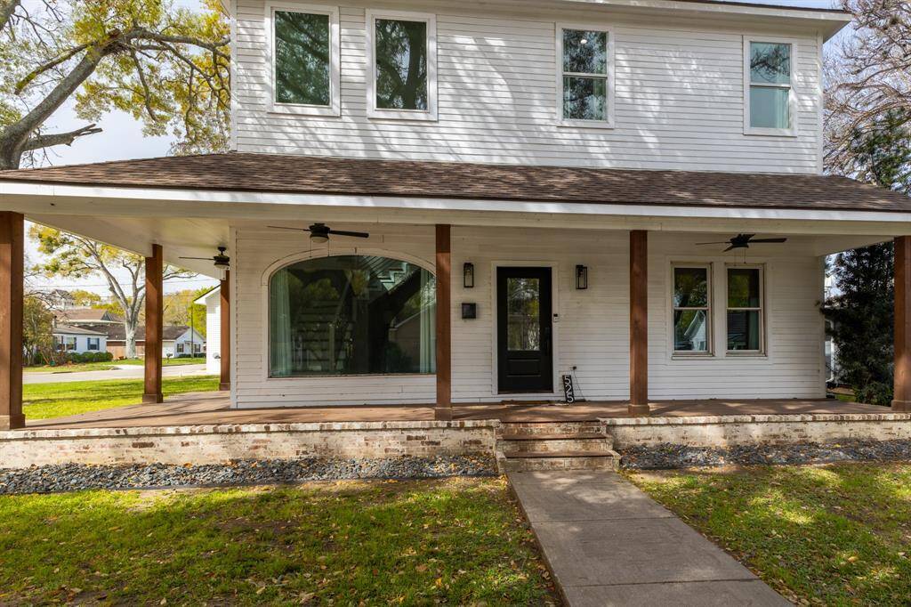 Large porch is great for watching the Fantasy of Lights parade, features ceiling fans and surrounded by shade trees. Set out your rocking chairs and watch the world go by!