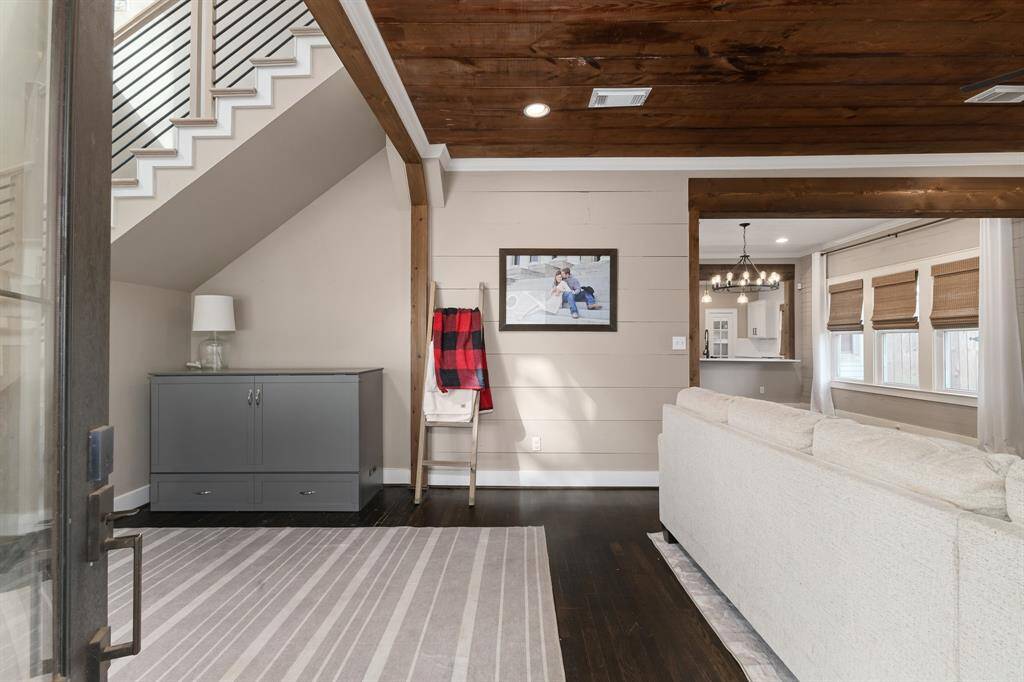Entry way from front door. Master 2nd story bedroom to the left, living room and kitchen to the right.