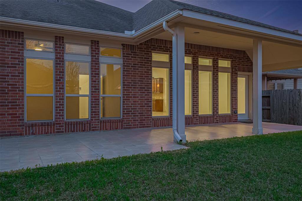 Enjoy your covered extended patio for outdoor relaxing and entertainment.
