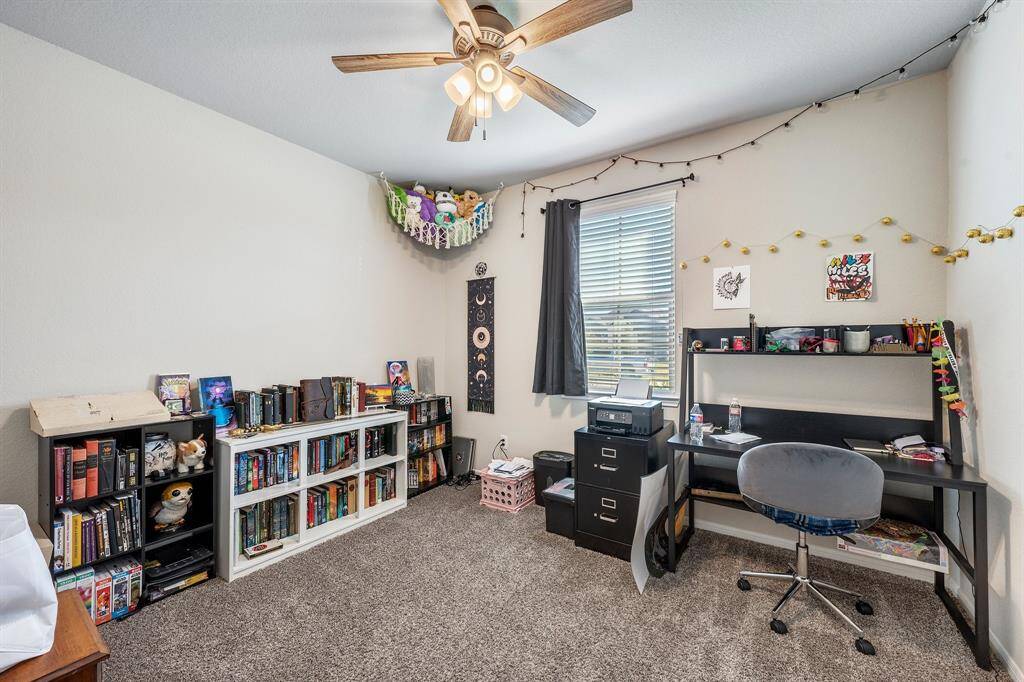 This bedroom is at the front of the home, making it perfect for either a bedroom or an office!