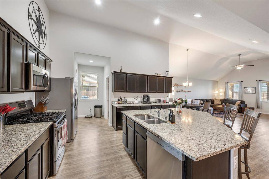 The kitchen is a work of art. With the huge island and plenty of cabinet space, preparing any scrumptious meal is a breeze!