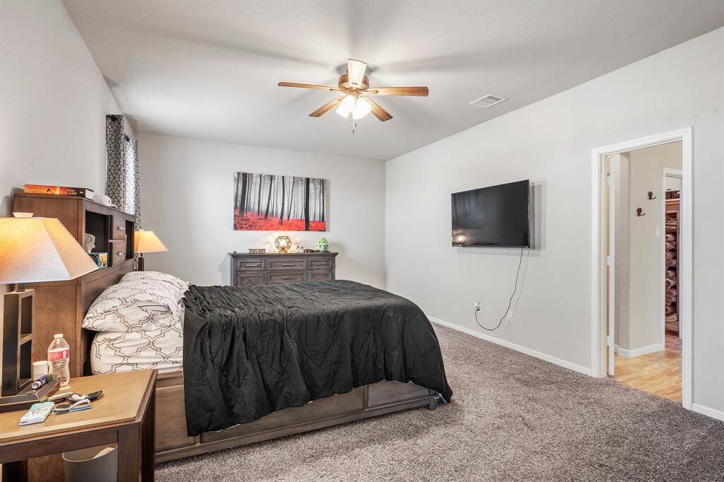 The primary bedroom is so big, you can fit a California King, 2 bedside tables, and 2 dressers in it and still have plenty of room leftover!