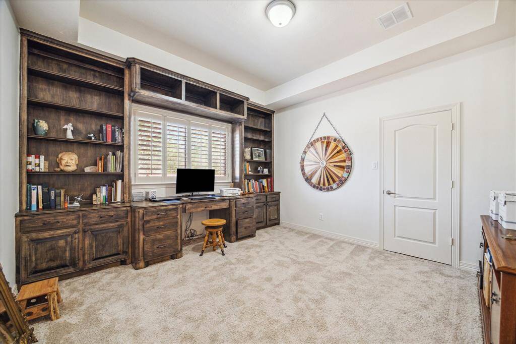 Office Space with custom cabinetry.