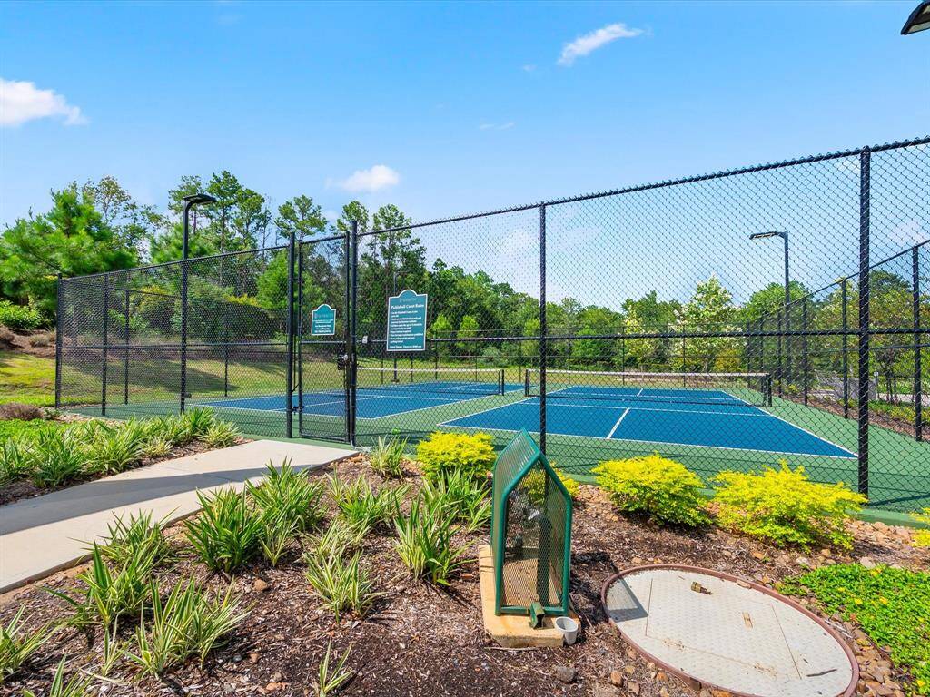 Community Amenities feature SPLASH PAD, COVERED PLAYGROUND, PICKLE BALL COURT, PAVILION, WALKING TRAILS