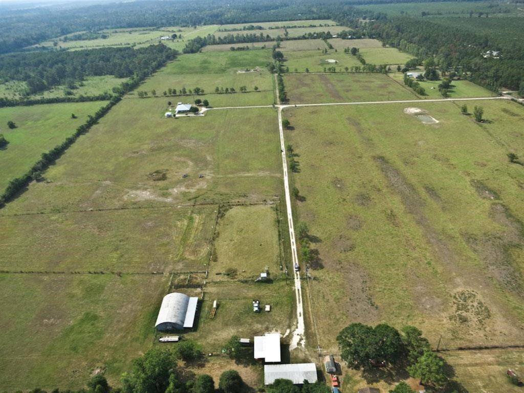 Aerial 1 - mostly cleared land with some trees.