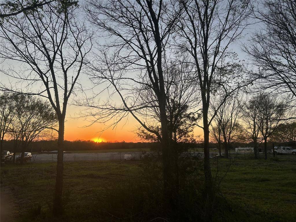 View of sunset from property